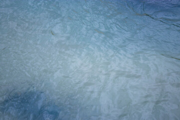 Obraz premium water surface of the city river