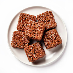 A Plate of Crispy Chocolate Rice Cereal Square Bars Isolated on a White Background
