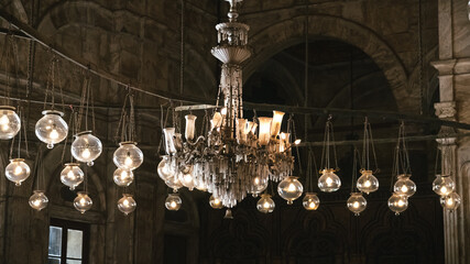 Interior of the minaret of the Crystal Mosque in the ancient city of Cairo, Egypt. Without people or tourists, with the chandeliers, the altar or mimbar. - obrazy, fototapety, plakaty