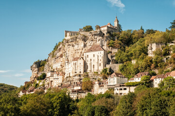 Perched on a cliff above a tributary of the Dordogne river, Rocamadour, a commune in the Lot region of France, dates back to the middle ages. It has been a centre of pilgrimage since the 15th century 