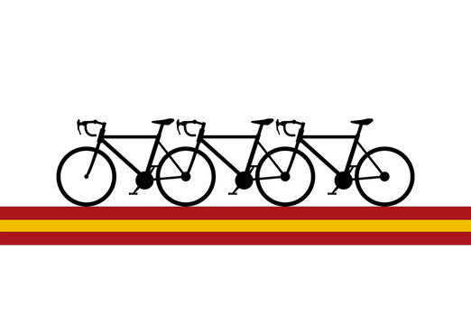 spain, cycling: bicycles in silhouette with the road formed by the three colors of the spanish flag. trail of the rainbow that is left while traveling by bike in Spain. vuelta 