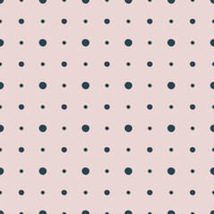 Minimal geometric polka dot pattern in pastel pink and navy blue. Evenly spaced big and small dots. Cute and simple neutral circle design is light and modest. Scandinavian style seamless pattern. 
