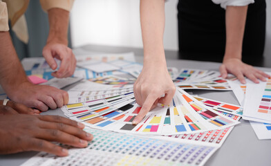 Professional Creative architect graphic desiner occupation choosing the Color pantone palette...