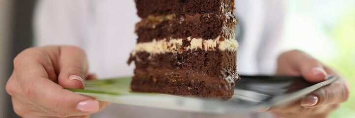 Female dietologist ask avoiding unhealthy sweet foods.