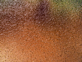 texture of the rough wall surface, plaster painted with colorful paints, colorful background for various projects, fashionable colors on the walls
