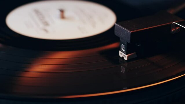 Turntable. Close-up Shot of a vinyl record and a turntable needle. Vintage vinyl record player.