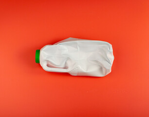 Empty Plastic Milk Bottle, Crumpled White Plastic Bottle, Global Pollution Concept, Squashed Pet...