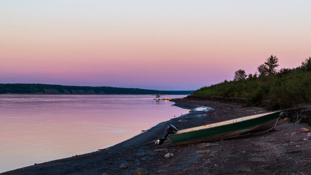 Boat on Riverbank at Sunset, Fort Simpson, Northwest Territories, Canada