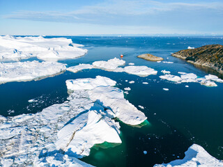 Greenland Ilulissat Icefjord Aerial View. Iceberg and glacier ice in Arctic nature landscape in Greenland. Ilulissat, Disko Bay, Baffin Sea, Greenland.  - obrazy, fototapety, plakaty