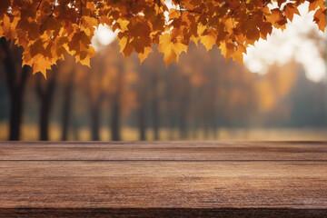 Naklejka na ściany i meble Beautiful natural wooden table with autumn background