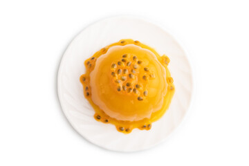 Mango and passion fruit jelly isolated on white, top view.