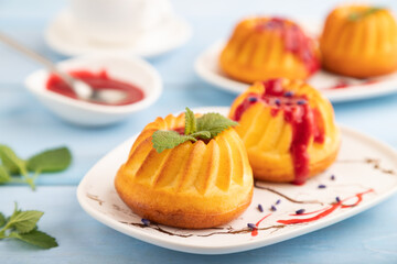 Semolina cheesecake with strawberry jam, side view, selective focus.