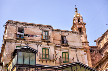 Palermo, Italy - July 18, 2022: Classic architecture and building facades on the streets in Palermo
