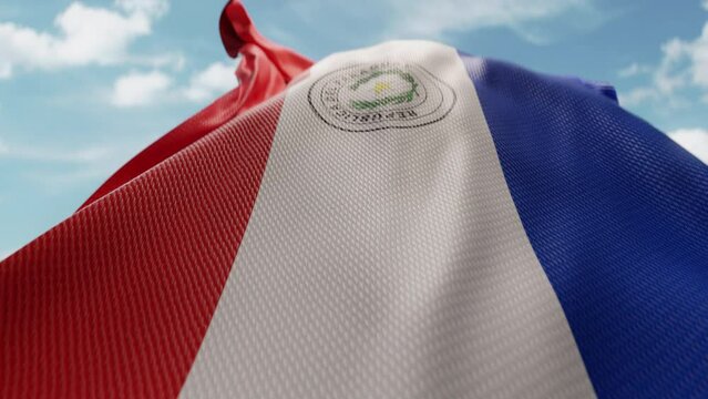 Wavy flag of Paraguay blowing in the wind in slow motion. Waving official Paraguayan flag team symbol abstract vertical background. Blue sky with clouds. World countries flying flags concept