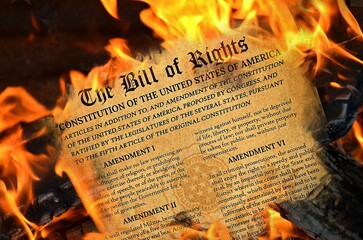 United States Bill of Rights burning in orange flames