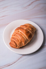 croissant bread on a plate.