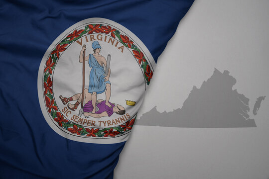 Big Waving National Colorful Flag And Map Of Virginia State On The Gray Background.