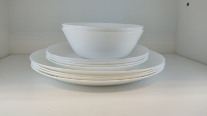 stack of white bowls