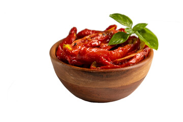 Dried tomatoes with fresh herbs and spices isolated on white background.