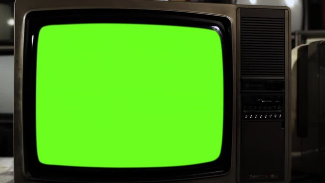 Vintage TV Green Screen. Close Up. Front View. You can replace green screen with the footage or picture you want with “Keying” effect in After Effects (check out tutorials on YouTube). 4K.
