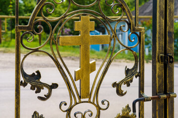 Cross as a religious symbol of Christianity. Background with selective focus and copy space