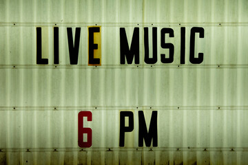 Live music signage outside honky tonk