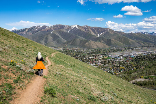 USA, Idaho, Hailey, Senior blonde woman hiking on Carbonate Mountain trail