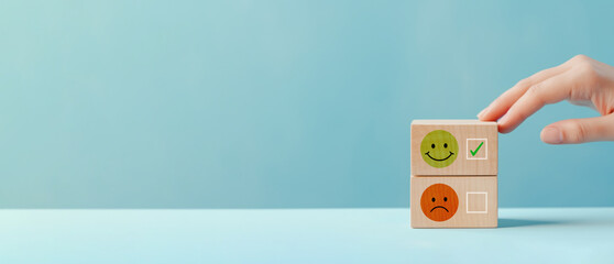 Woman hand choose wood cube with smile and sad icon, World mental health day or feedback rating...