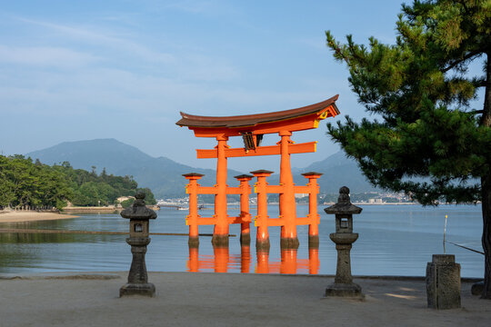 Hiroshima, Japan - July 27, 2023: Close up image of Itsukushima Shrine's torii gate at Miyajima in Hiroshima at daytime.