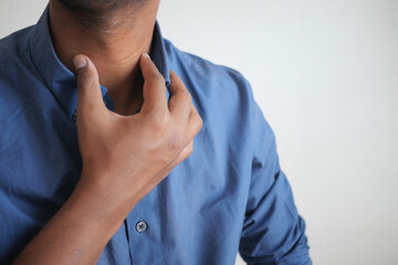 unrecognized man suffering throat pain close up 