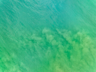 Waves sea water surface nature background,Sun rays over sea, Bird's eye view ocean in sunny day,Sea...