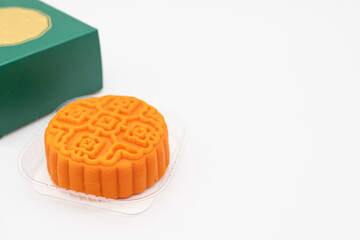 Moon cake with green box. Moon cakes gift box for the Chinese Mid-autumn festival on isolated background.