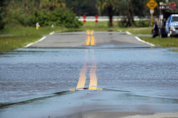 Hurricane flooded street in Florida residential area. Consequences of natural disaster