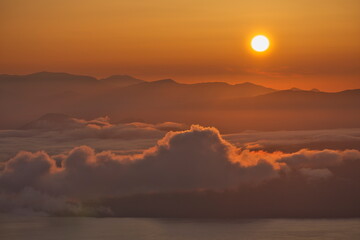 
Hokkaido, Japan - September 8, 2023: The morning sun and sea of clouds over Lake Kussharo, Hokkaido, Japan
