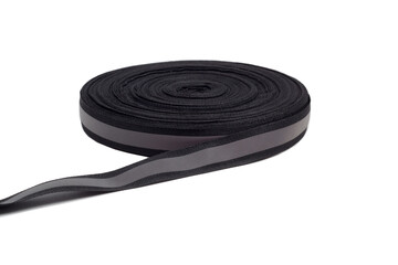 A roll of reflective tape on an isolated white background