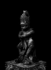 indian monkey, statue of hindu god hanoman on a black background