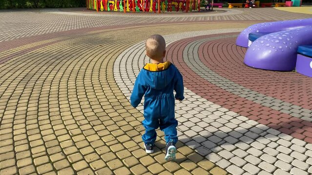 toddler child in amusement park Divo Ostrov, St. Petersburg, Russia
