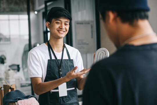 Seller and customer transaction at handcraft market. Small business.