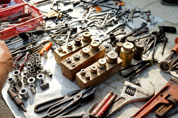 Fototapeta premium used iron flea market, a collection of screwdrivers, pliers, screwdrivers and iron scales for sale