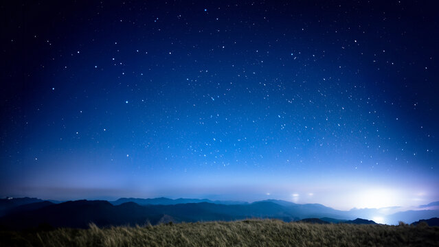 mountains at night Chilling mountain peak filled with smoke and stars © nana