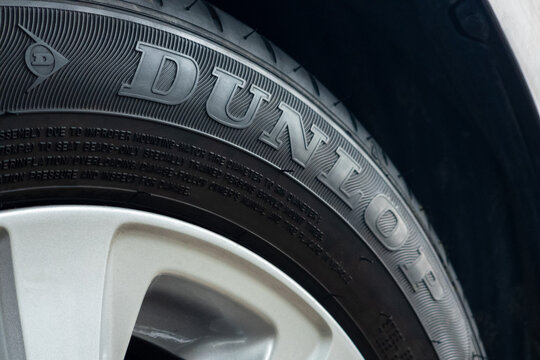 Chiang Mai, Thailand - 20 Sep 2023. Dunlop tire installed on wheel car.