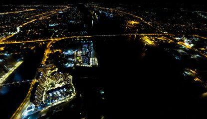 Astrakhan, Russia. Panorama of the city from the air. Night city lights. Aerial view