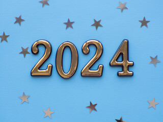 2024 on blue background with silver stars