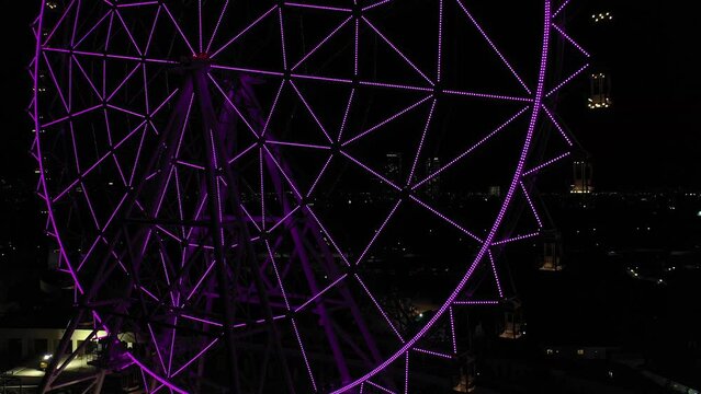 Drone close-up: Colorful ascent of the newest Ferris wheel at Aztlan Parque Urbano, Chapultepec.