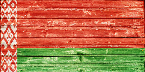 Flag of Belarus with the texture of old wooden boards. Belarusian flag on a wooden surface.
