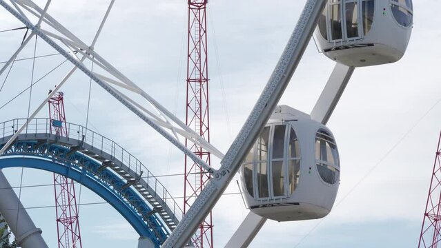 attraction Ferris wheel in amusement park Divo Ostrov, St. Petersburg, Russia