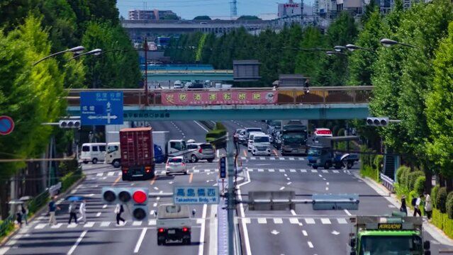 A timelapse of traffic jam at the downtown street in Tokyo telephoto shot zoom