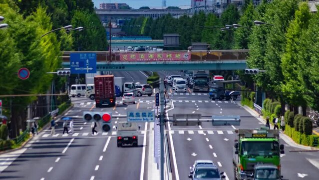A timelapse of traffic jam at the downtown street in Tokyo telephoto shot tilt