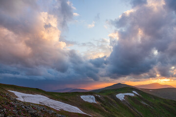 The evening sky over the mountains.