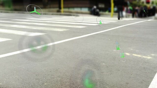 Animation of multiple floating icons over time lapse of people crossing street